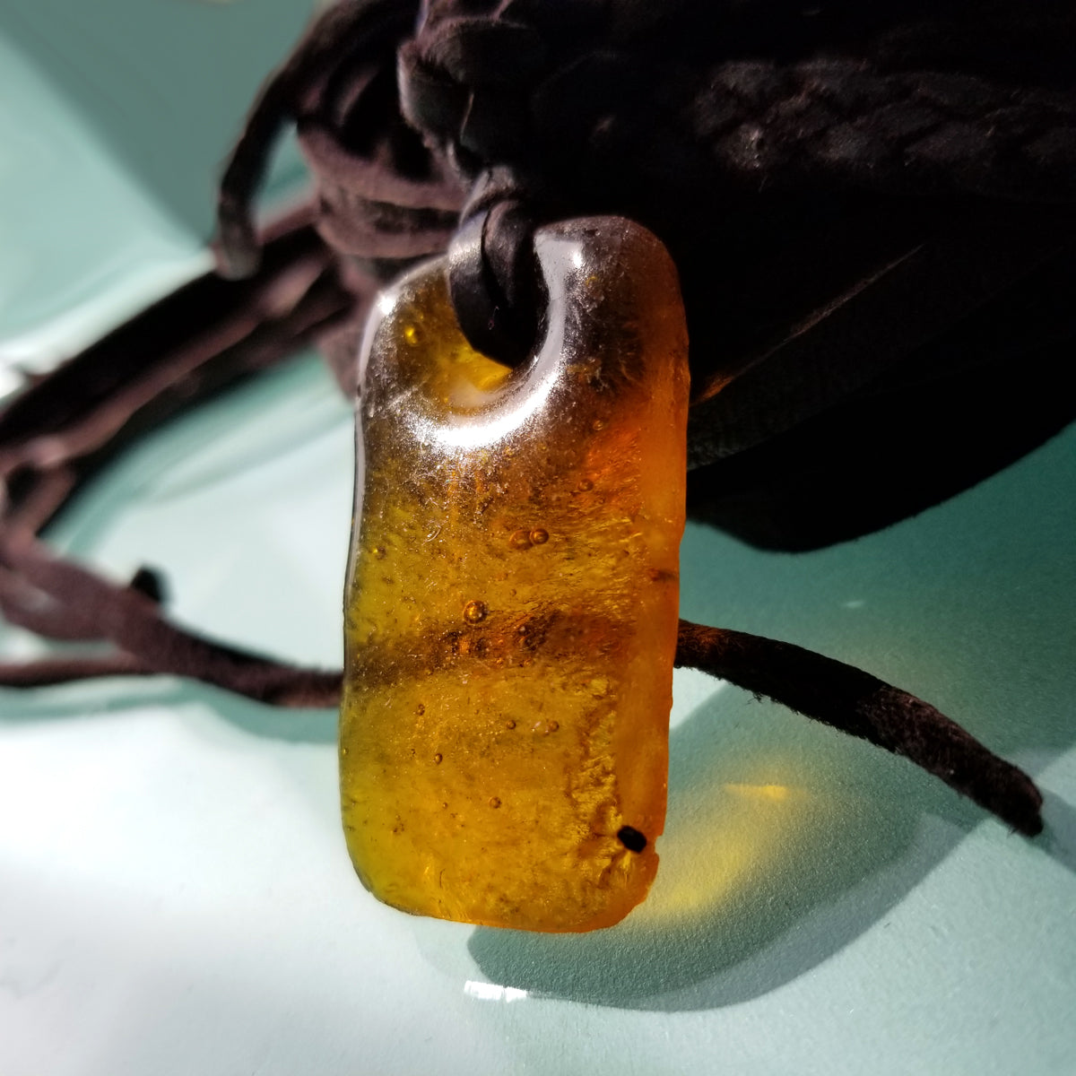 Ziri African Glass Pendant Braided Leather Choker Style Necklace; AMBER COLOR pendant on a Leather Choker with Leather Fringe Tassels and African beads