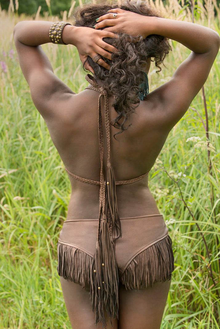 deerskin leather booty boy shorts bikini bottoms, and triangle bikini top in goat suede on model