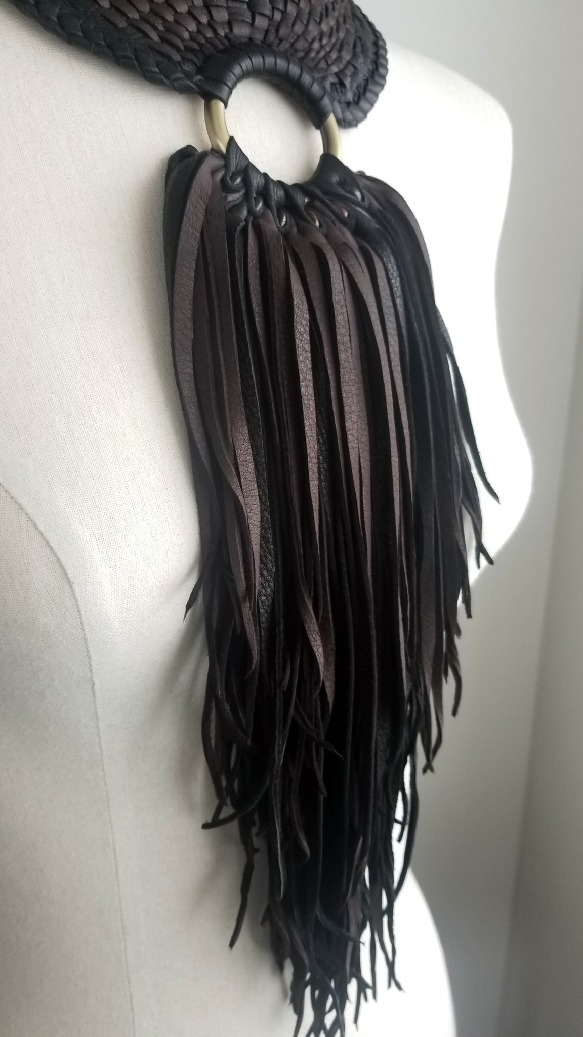 Zanta African Inspired, Braided Leather Statement Necklace, Bib Neckpiece, woven collar, fringe and tassels, on a dress form