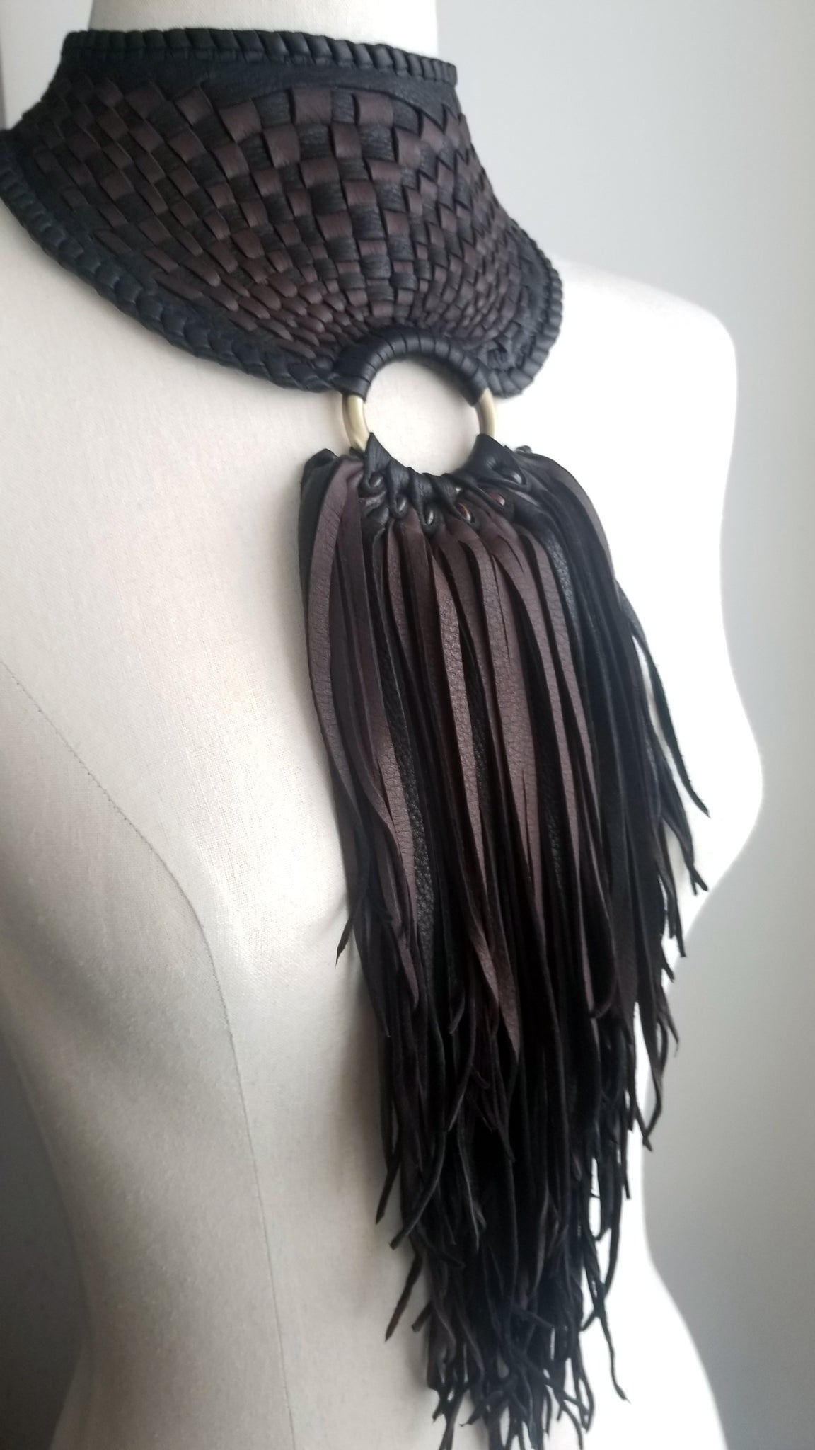 Zanta African Inspired, Braided Leather Statement Necklace, Bib Neckpiece, woven collar, fringe and tassels, on a dress form