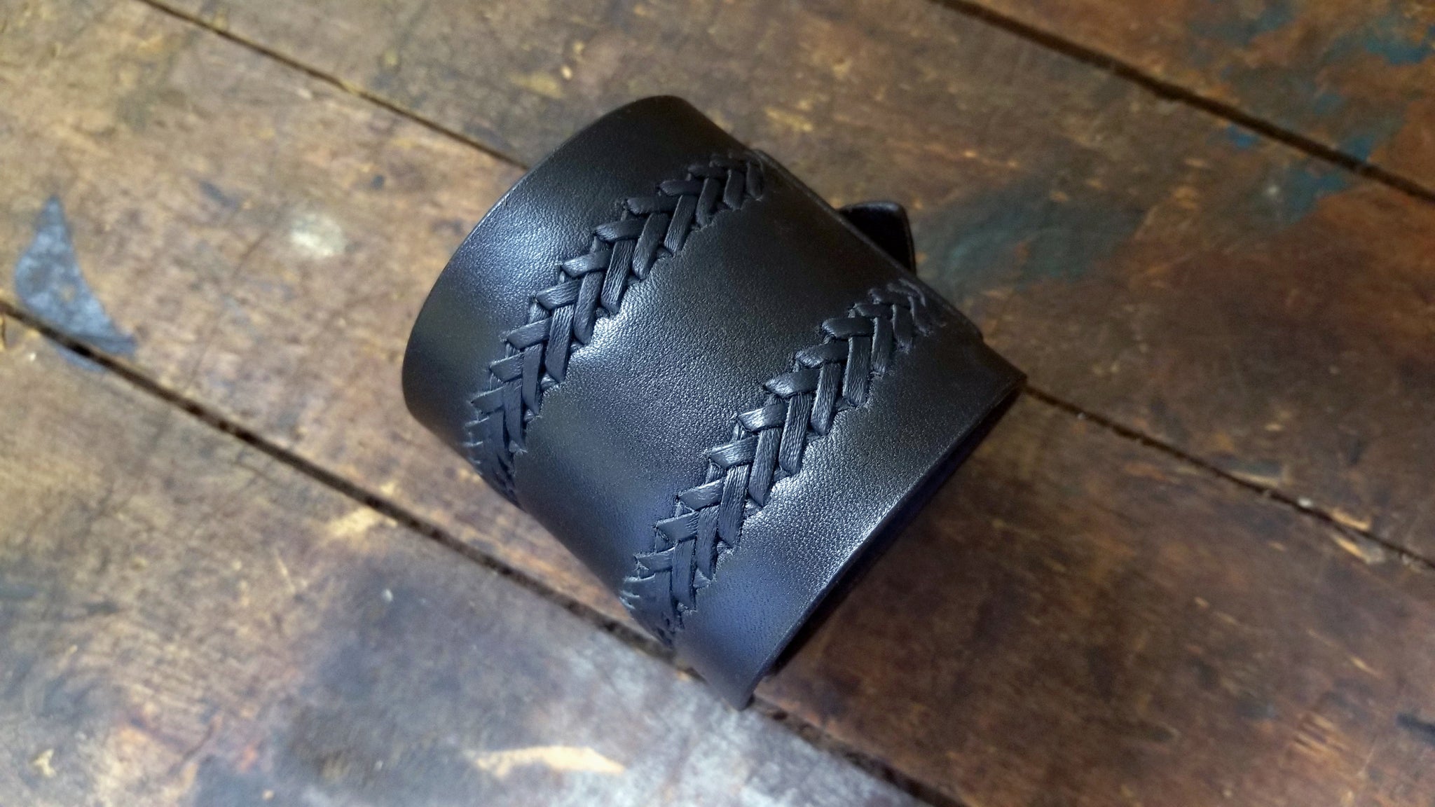 Aga Leather Cuff, wide wrist band with hand braiding detail