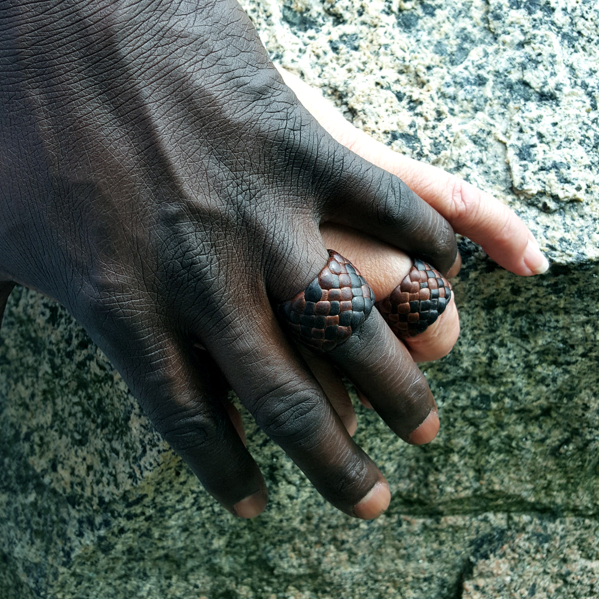 Leather Rings | male and female models hands wearing Kama Braided Leather Rings