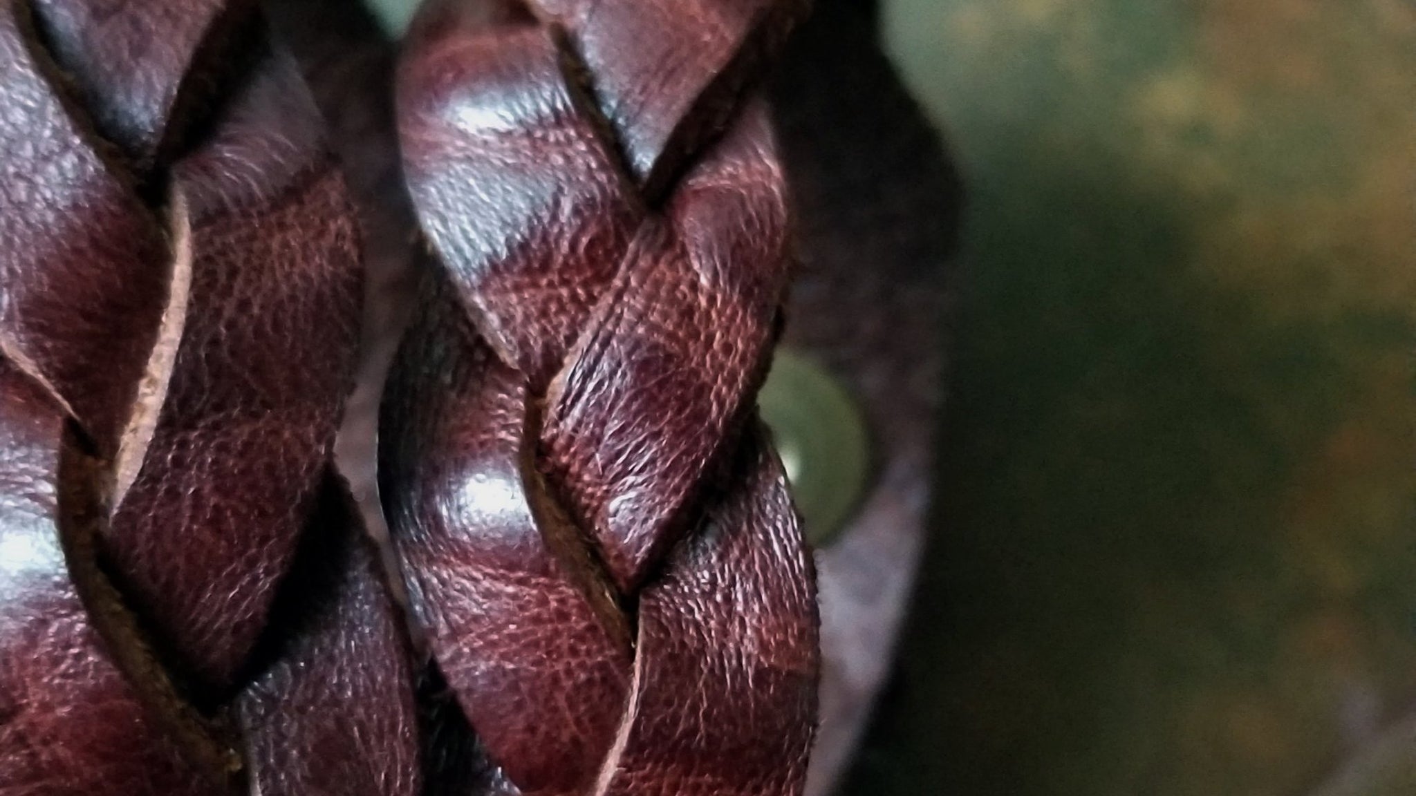 close up of mystery braid (trick braid) braided leather bracelet, men's women's in the color Cognac