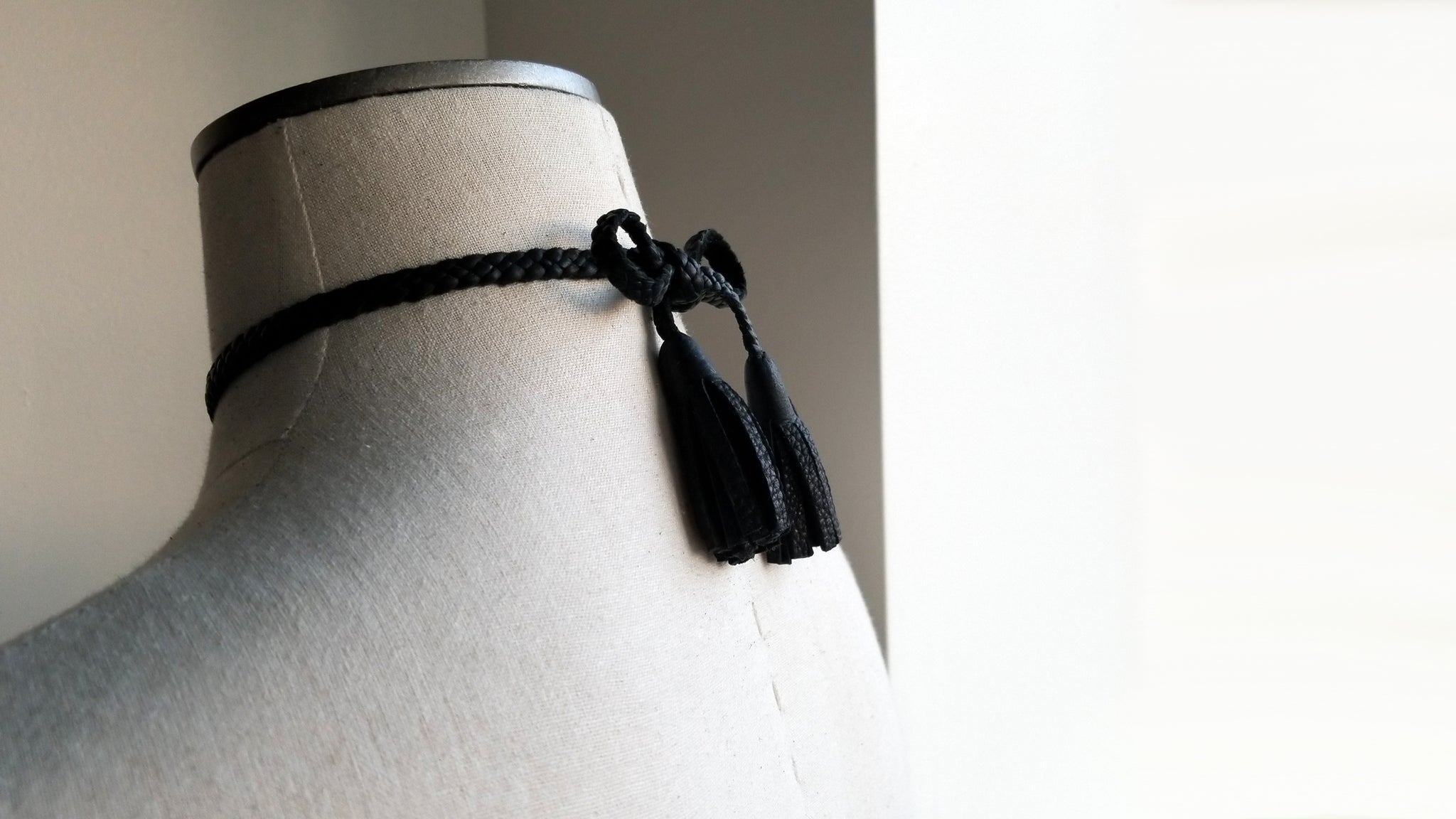Tilu Leather Tassel Necklace back, bow and tassels, in black deerskin leather