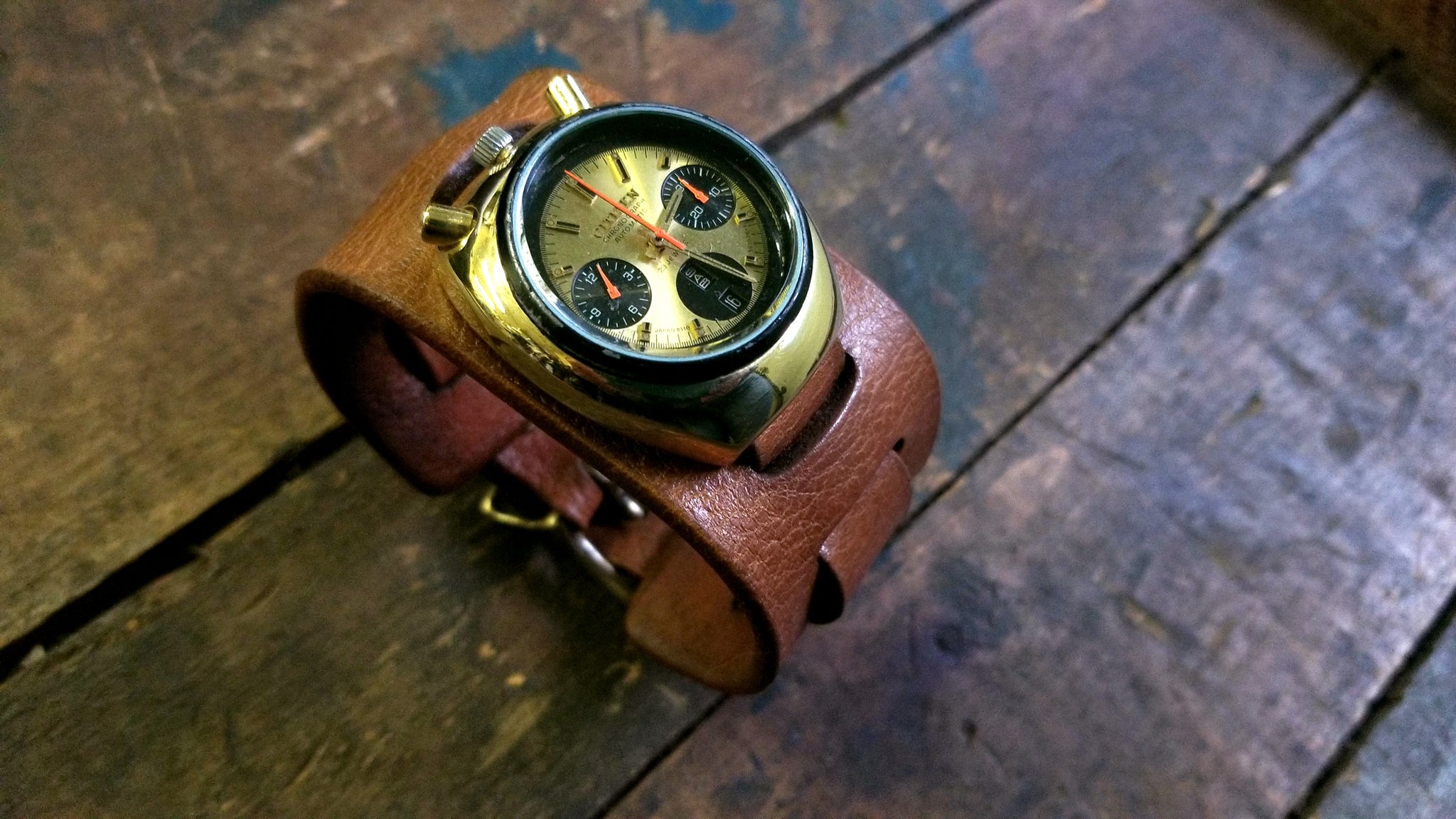 bund style military watch band featuring a Citizens 8110 Bullhead like the one worn by Brad Pitt in the movie, "Once Upon a Time in Hollywood".