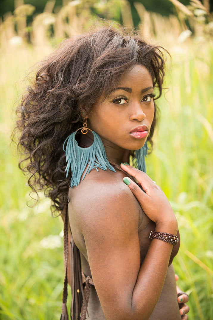 Suede Fringe Hoop Earrings on model