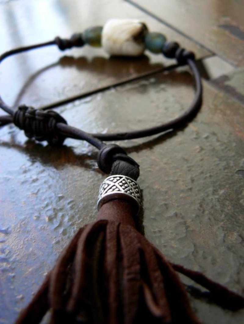 Naja Vintage Conch Shell & Glass Beaded Adjustable Leather Bracelet close up leather tassels