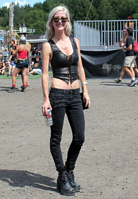 A customer, Emily, wearing a black deerskin leather Rebel Halter Top