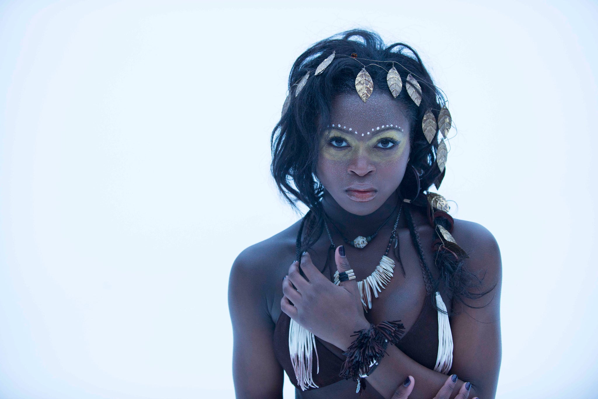 female model wearing Anya deerskin Tassel Bracelet in mahogany and chocolate combo