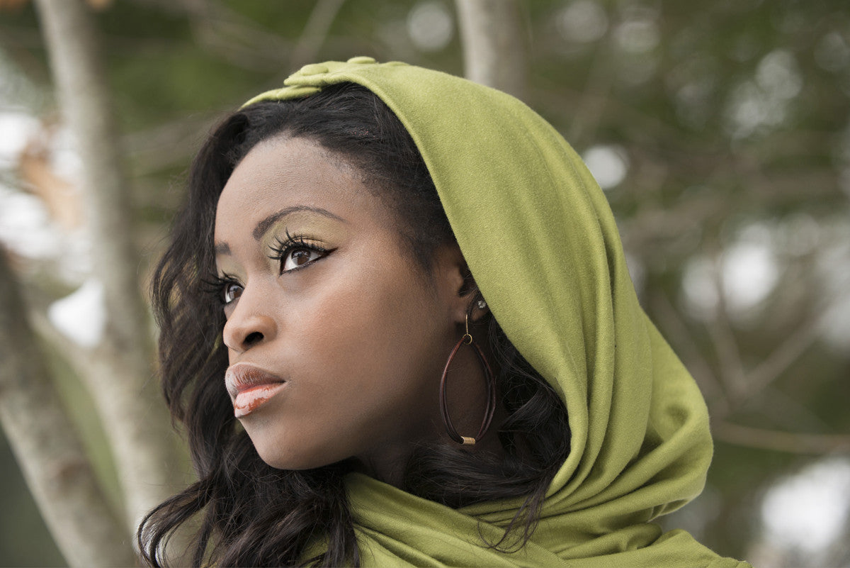 Oki Leather Hoop Earrings - Handmade African Coil Bead Earrings on model