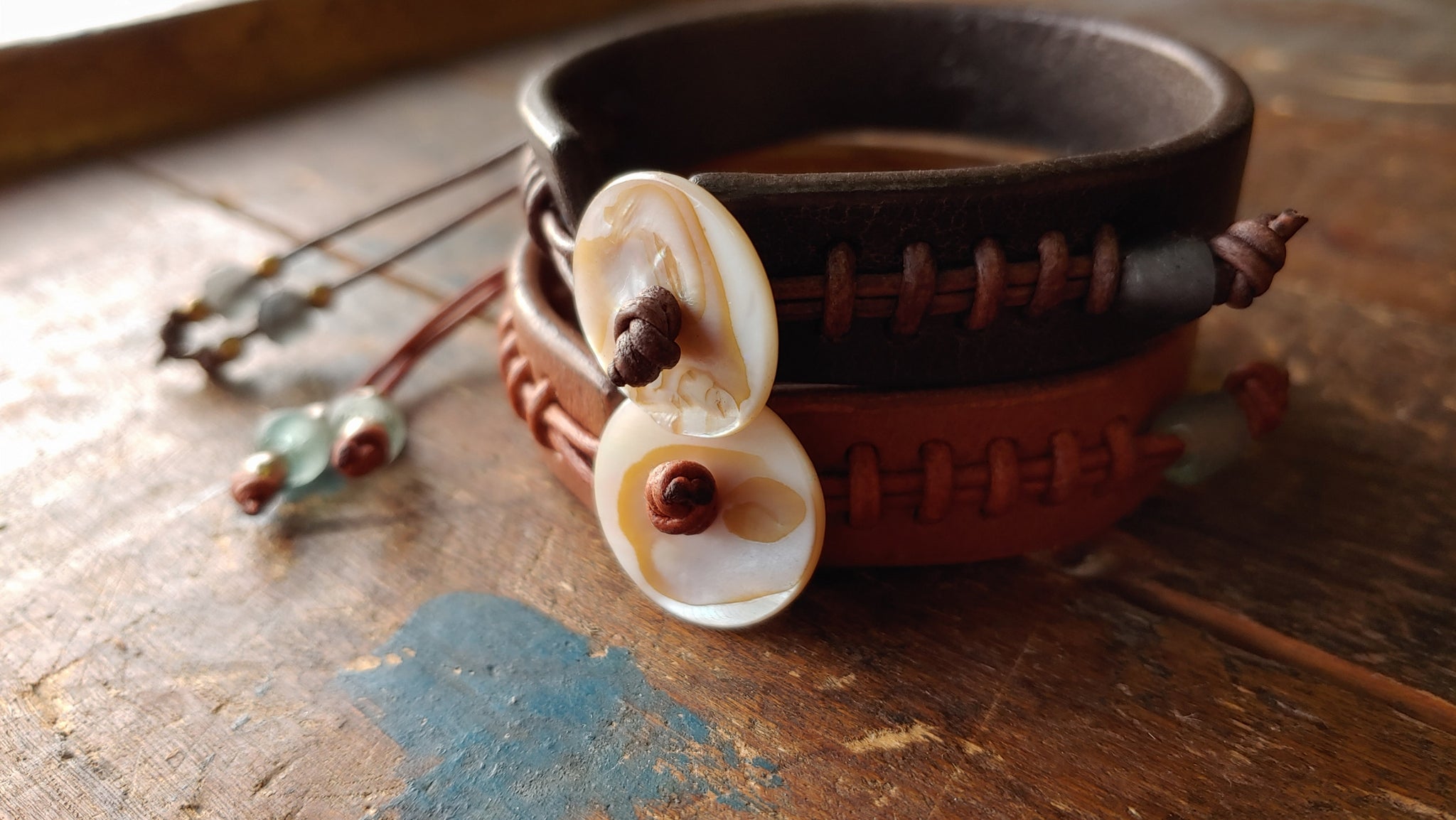 Cliff Booth (Brad Pitt) inspired bracelet in the color Tobacco with seagreen and silver African Beads and chocolate Brow w/ Denim Blue and Brass African Beads