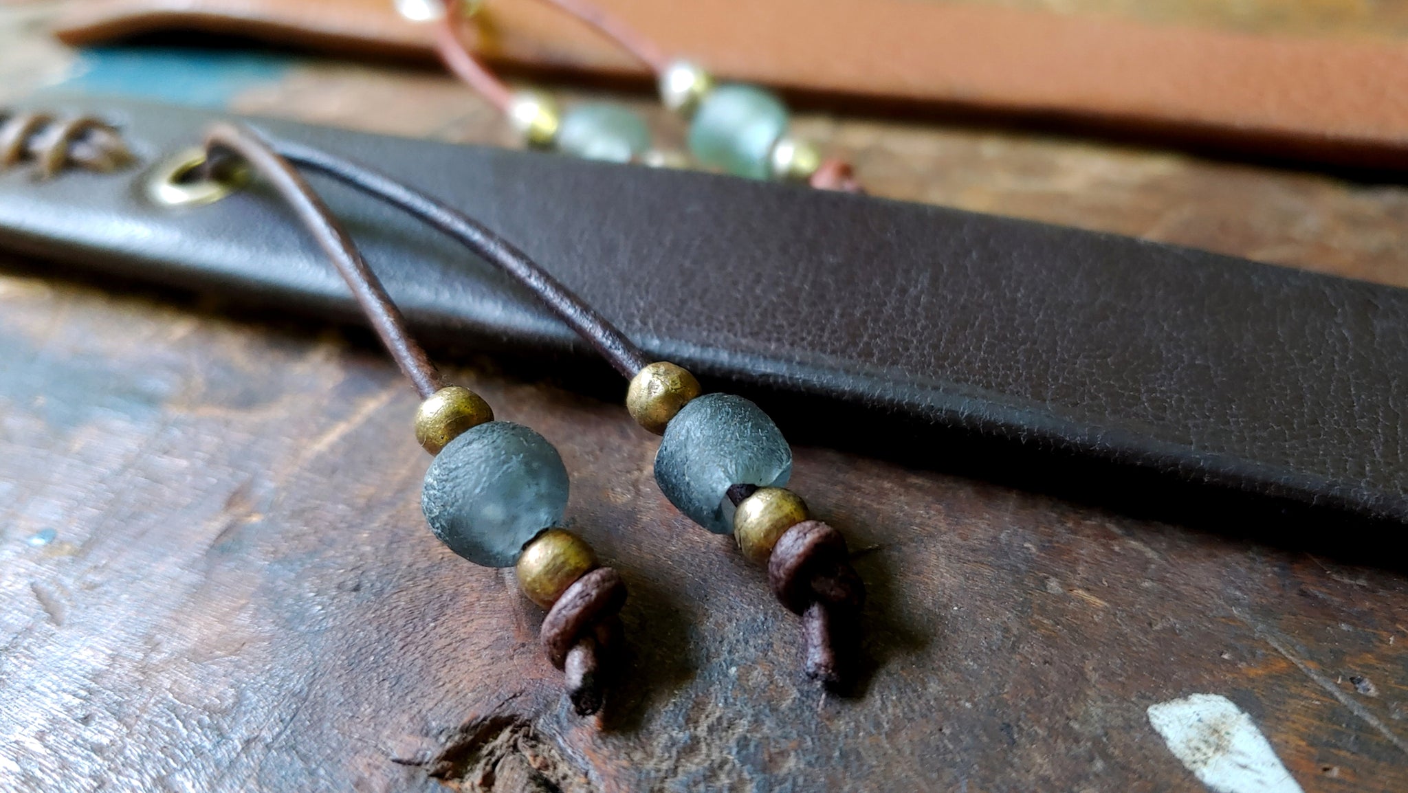 Cliff Booth (Brad Pitt) inspired bracelet in the color Tobacco with seagreen and silver African Beads and chocolate Brow w/ Denim Blue and Brass African Beads