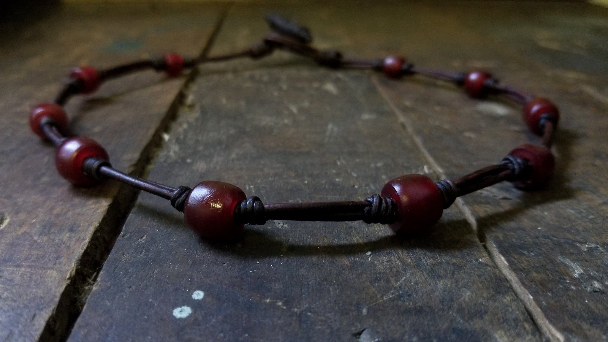 Chuma Necklace; antique chocolate brown leather cord with mahogany Brown African Trade Beads, Bison Leather Button and Loop Clasp