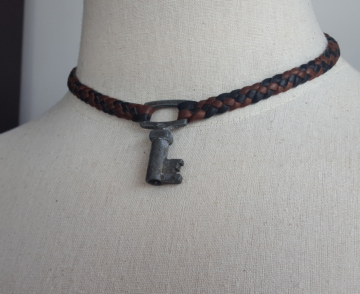 key pendant leather necklace - braided leather key necklace  on female mannequin