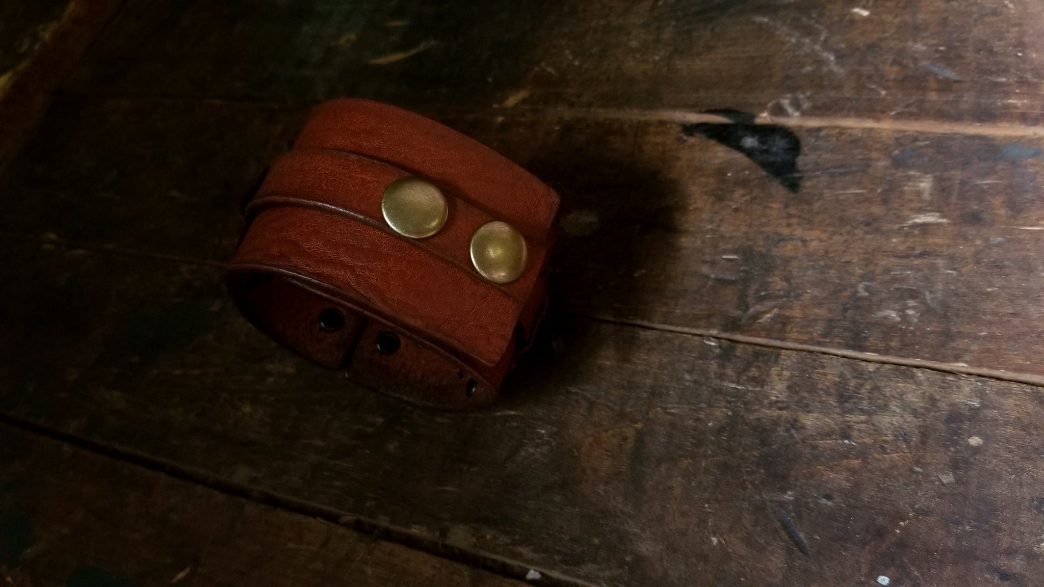 Hook Leather Cuff - Slim. Wide leather snap cuff with antique brass hook & latch in the color tobacco