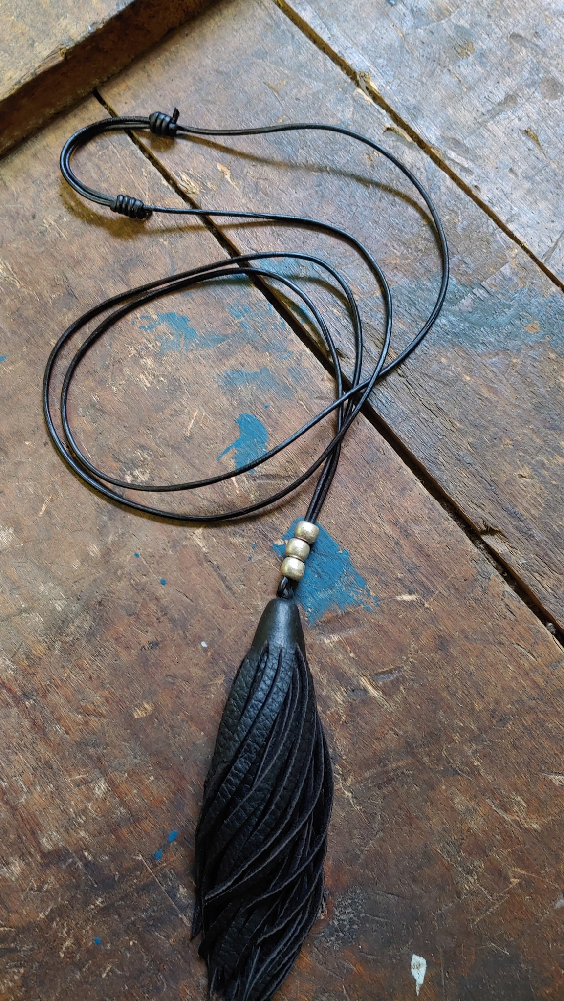 slip knot adjustable leather necklace with black deerskin leather tassel and silver African metal beads