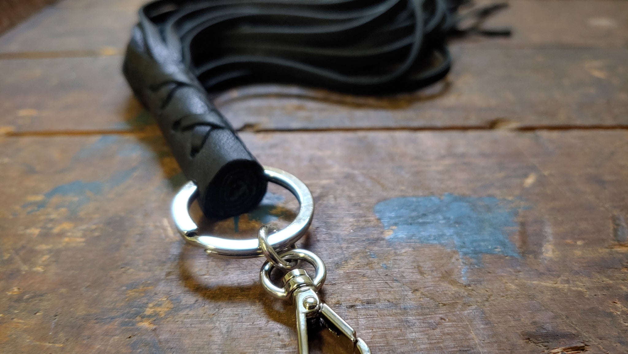 Nala Leather Tassel Key Chain in black deerskin with silver clip