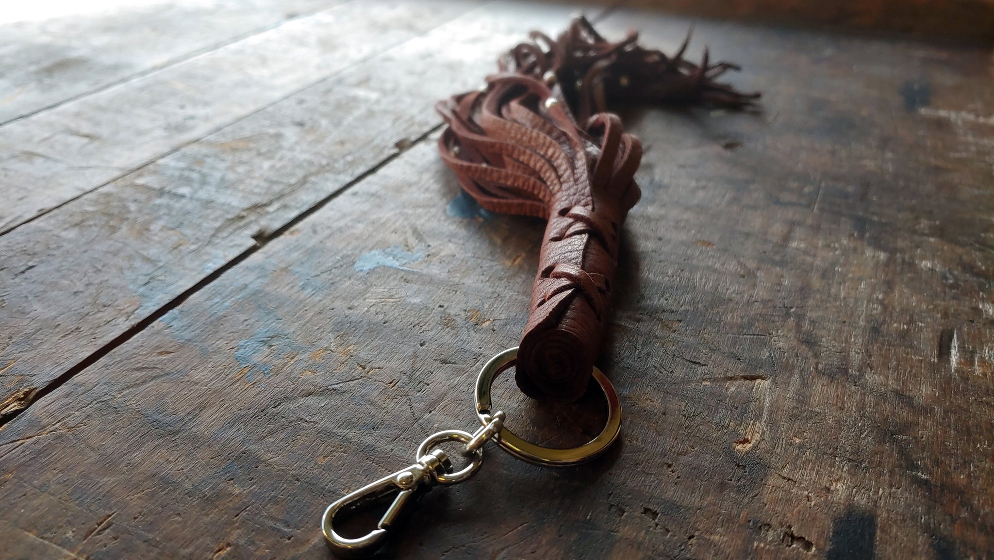 Nala Leather Tassel Key Chain in mahogany deerskin with silver beads and clip