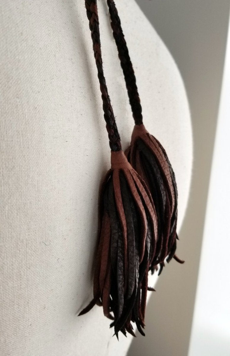 chocolate and black leather tassels on the slave necklace